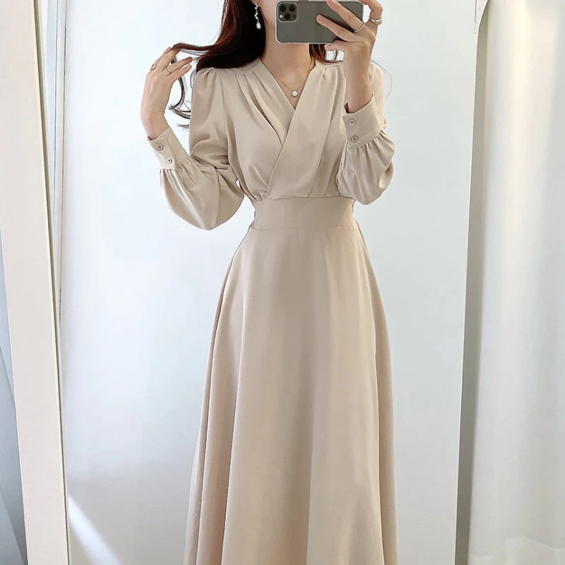 Heidi-Mode | Elegantes Kleid mit Puffärmeln und V-Ausschnitt In A-Linie - Image 7