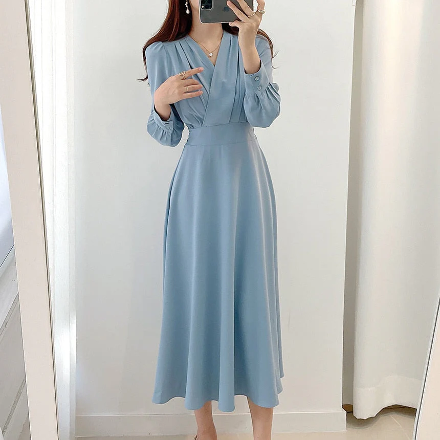 Heidi-Mode | Elegantes Kleid mit Puffärmeln und V-Ausschnitt In A-Linie - Image 9