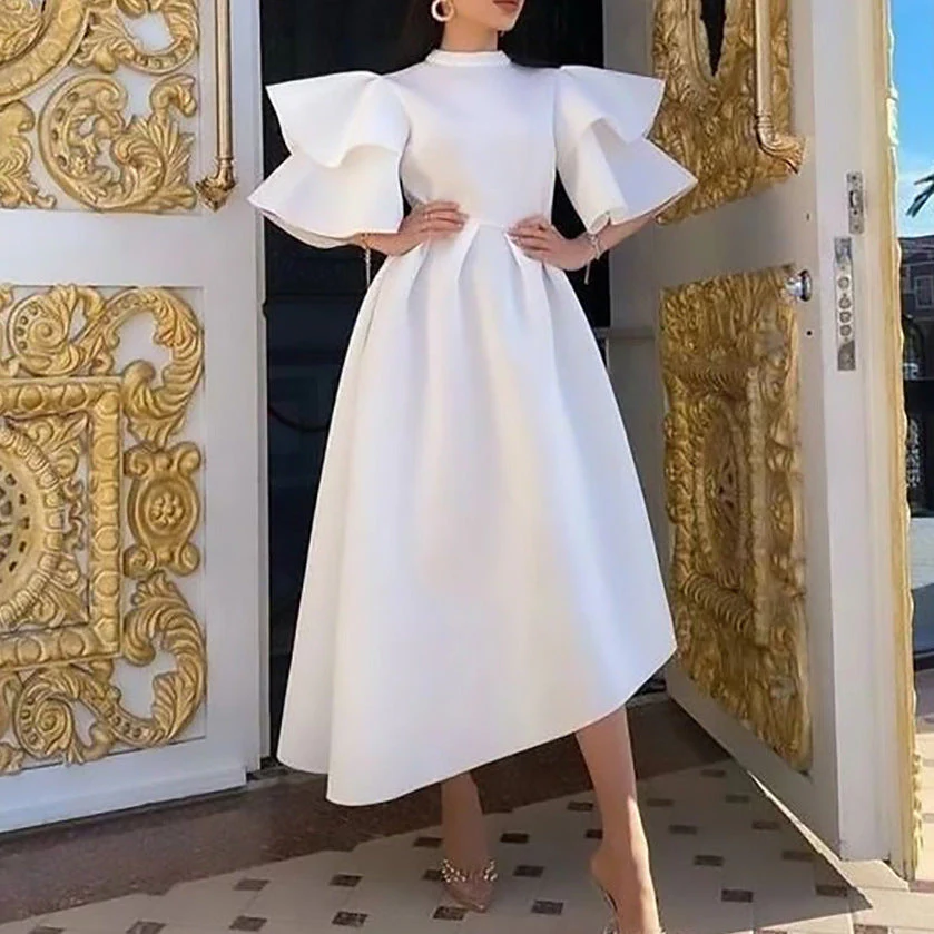 Heidi-Mode | Kleid mit Lotusblattärmeln und Einfarbigem Weitem Schnitt - Image 4